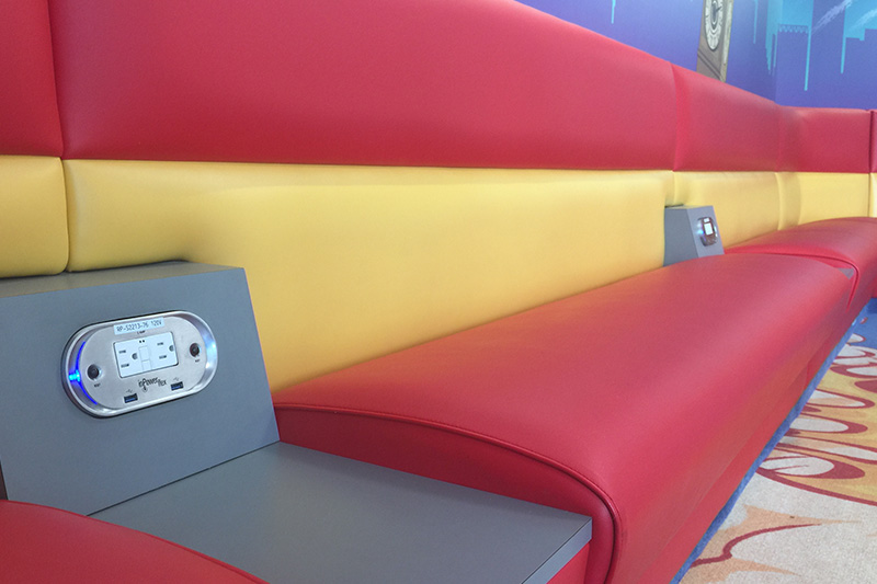 power outlets on bench in children's play area