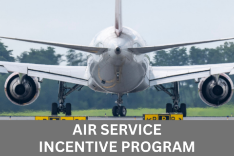 Rear of an aircraft on a taxiway at BWI Thurgood Marshall Airport with an overlay of text that reads Air Service Incentive Program