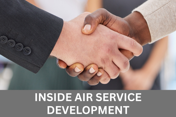 Close-up of a handshake with white text in a grey box along the bottom of the image that reads Inside Air Service Development.